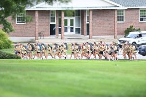 Road for Hope walkers in front of campus