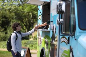 Student getting Ben & Jerry's from voter registration day