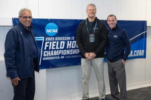 President Joseph A. Favazza, Ph.D., (left) and Vice President for Athletics Daron Montgomery (right) welcomed new NCAA President Charlie Baker