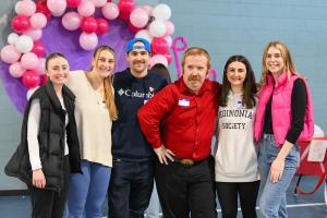 Students with an attendee at the Valentines dance