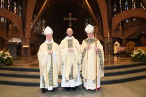 From left: Abbot Mark Cooper, O.S.B. ’71, Fr. George Benjamin Rumley, O.S.B., the Most Reverend Robert P. Deeley, J.C.D., Bishop of Portland.
