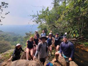 Students hiking a rainforest trail in Belize