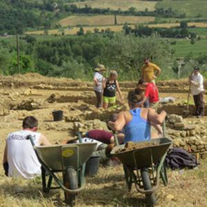 People working on an archaeological dig site