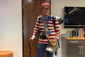 Kathy Beck dressed up as Waldo from the Where's Waldo vooks.