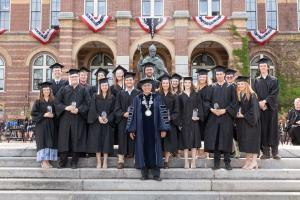 President Favazza with students at the Baccalaureate Mass & Convocation