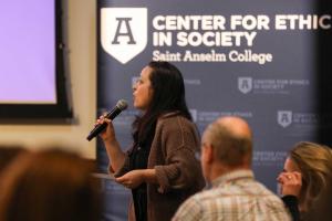 Speaker at a housing event in the NHIOP