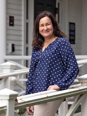 Sara Smits Keeny in front of Collins House