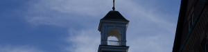 Evening image of a building cupola on Saint Anselm's campus