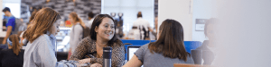 students chatting in the cafe