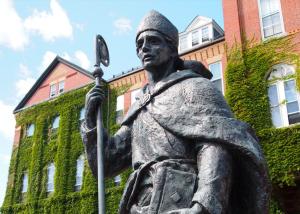 statue in front of alumni hall