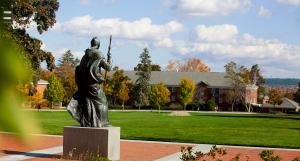 Saint Anselm statue in front of Alumni Hall