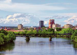 manchester, new hampshire skyline over river