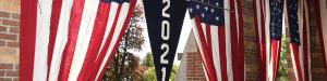 2021 banner in front of alumni hall