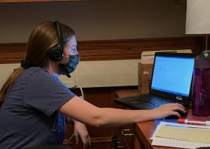 student in phonaton room