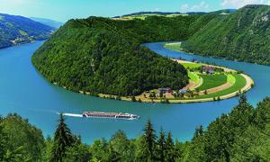 cruise ship navigates a river