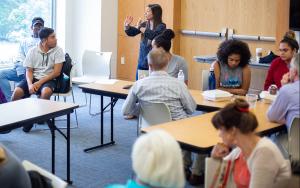 Students taking part in a Come Friday Forum