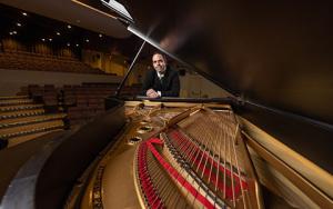 Sean Parr behind a piano