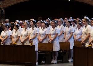 Nursing students stand in the Abbey Church