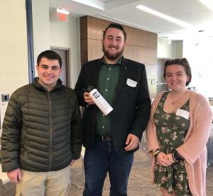 Three students from the winning ethics bowl team