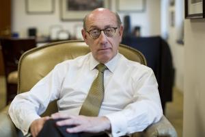 Ken Feinberg sitting in his office