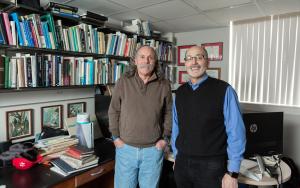 Professor Jay Pitocchelli and Professor David Guerra standing in an office