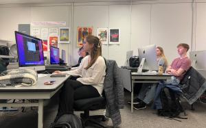 Students working on a project in the Comiskey computer lab