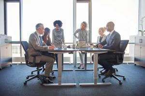 Meeting between colleagues in a board room