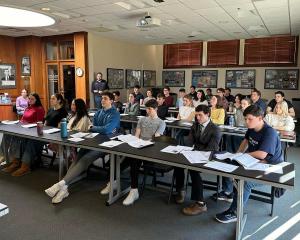 New NHIOP ambassadors sitting in classroom