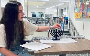 Student in the multifaith prayer room