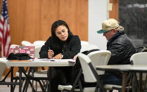 Students giving tax assistance