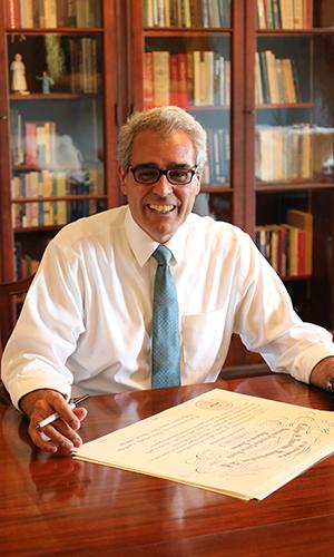 President Favazza at his desk