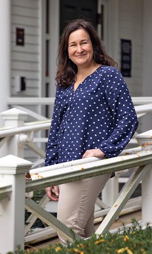 Sara Smits Keeny in front of Collins House
