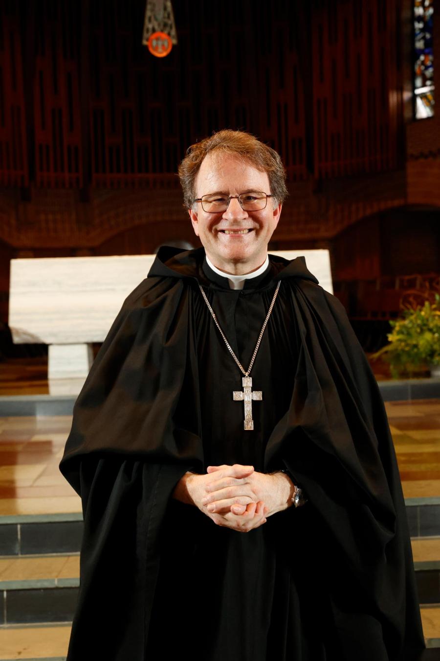 The new abbot, Br. Isaac Murphy, O.S.B. standing in the Abbey Church