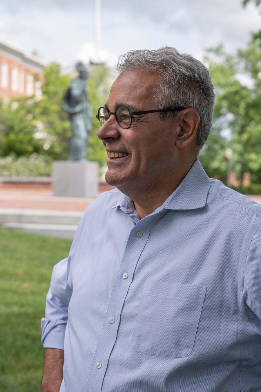 President Favazza standing on Alumni Quad